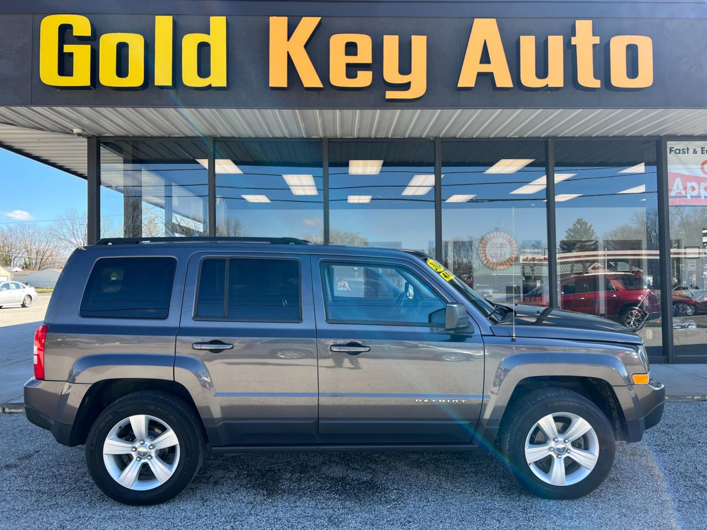 2014 Magnetic Metallic Jeep Patriot (1C4NJRFB1ED) , located at 1633 W Kimberly, Davenport, IA, 52806, (563) 323-5341, 41.559456, -90.598732 - Photo#0